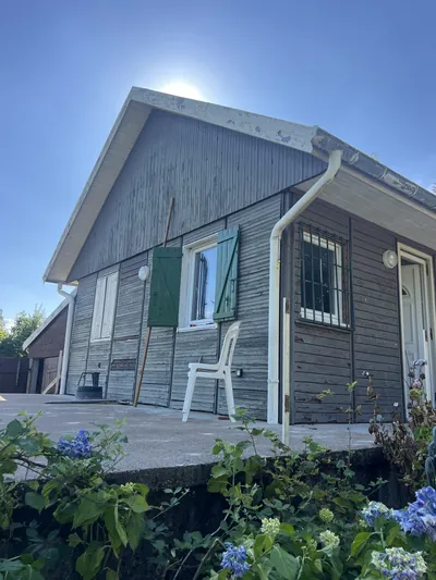 Le chalet avant les travaux, avec son ancien bardage gris